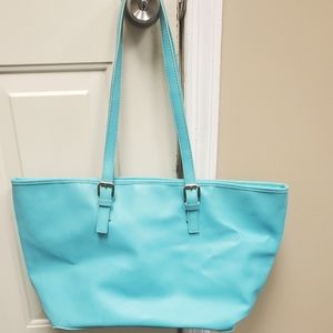 Aqua tote bag with a few stains